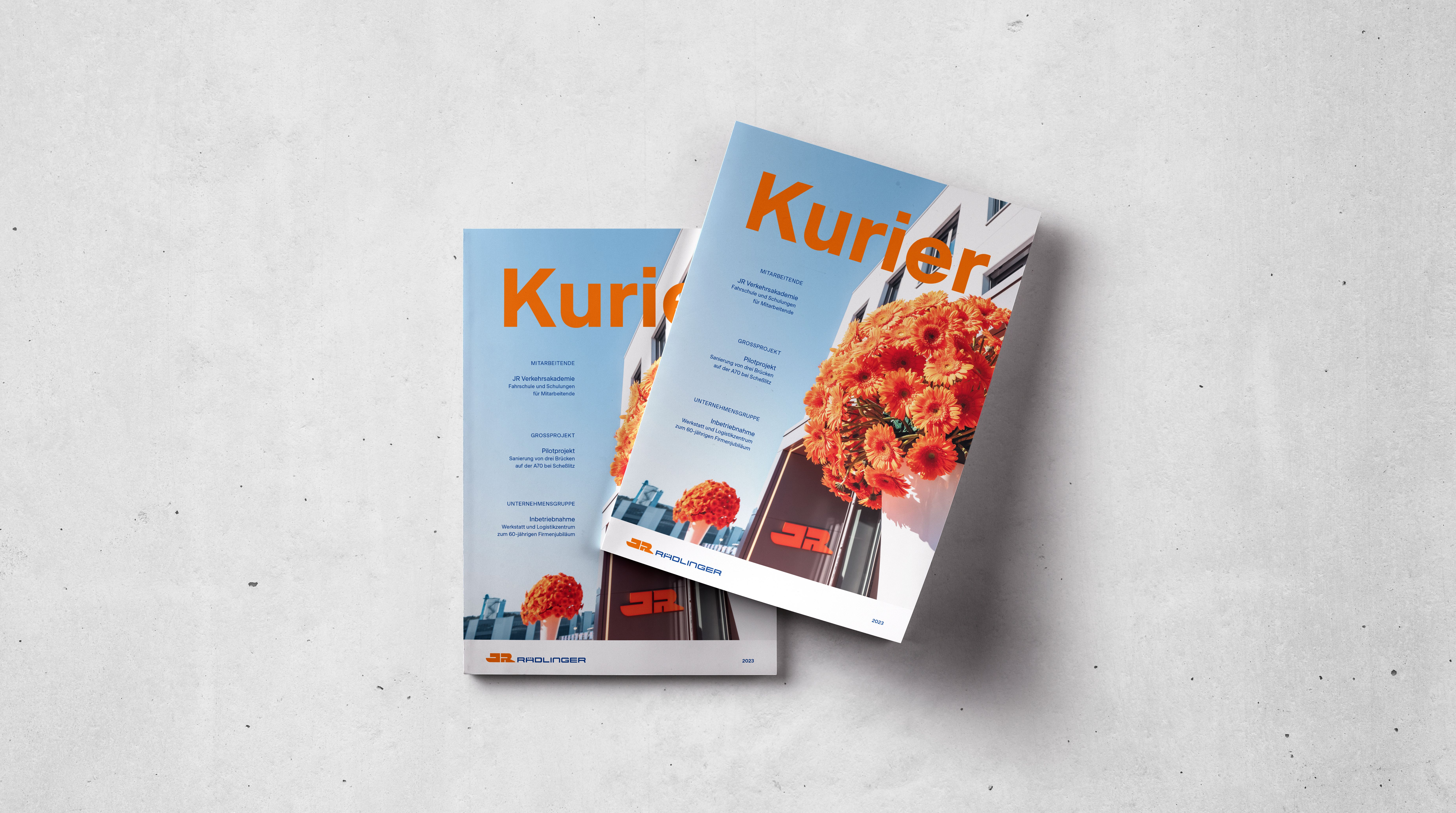 Titelblatt des JR Kuriers 2023, dem Unternehmensmagazin der Josef Rädlinger Unternehmensgruppe